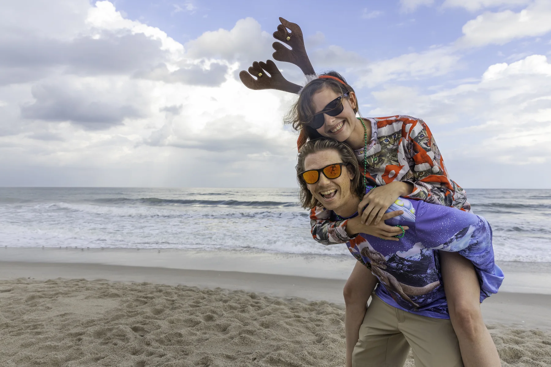 Family portrait session on Brevard County beach at golden hour